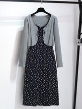 A two-piece set of floral halter dress and cardigan
